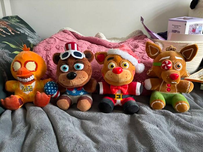 Five Nights at Freddys plushies and dragon figures