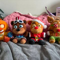Five Nights at Freddys plushies and dragon figures