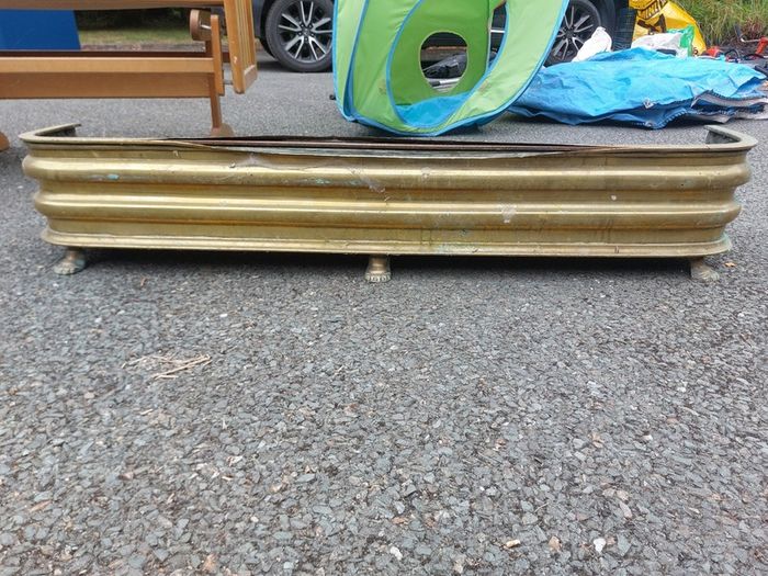 Antique brass fireplace fender