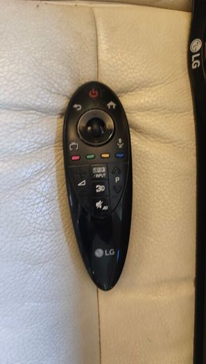 LG 40" Ultra HD TV + Wall bracket ( new in box)