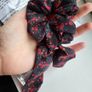 AVON Scrunchie with tail, black in red flowers,  NEW Image 4