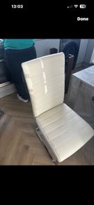 two white dining chairs