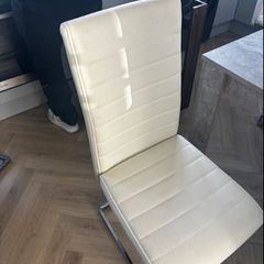 two white dining chairs