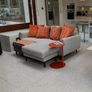 L-Shaped Sofa with grey matching cushions Image 2