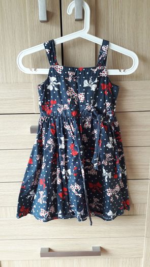 A bunch of little girls dresses