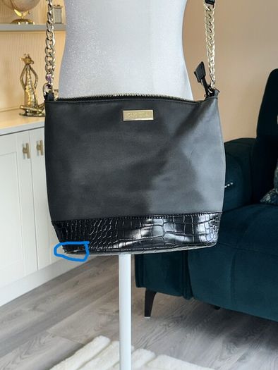 Carvela Black Handbag with gold chain.