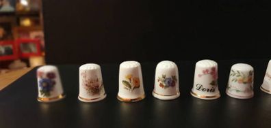 Collection of Flower Themed Gold Coloured Edged Thimbles