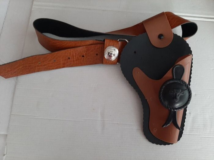 vintage new toy gun in box and holster