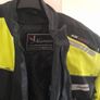 Selection of quality motorbike jackets,  trousers,  helmets  , and boots .. Image 5