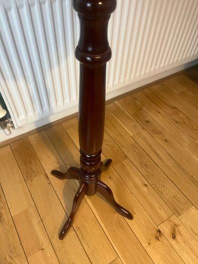 Solid maghoney plant stand. 34in high x 13in diameter