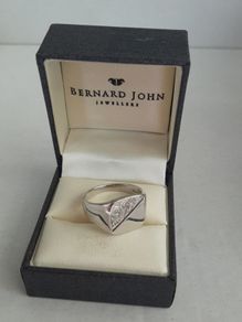 New silver identity ring in box
