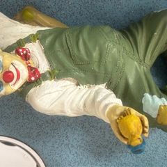 vintage clown holding ducking
