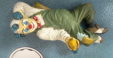 vintage clown holding ducking