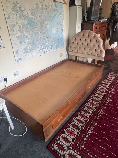 Wooden single bed with drawers