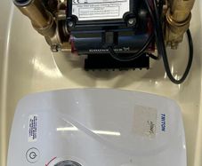 Premium Shower Boost Set: Grundfos Brass Pump + Triton Quiet Shower (1 Year Old)