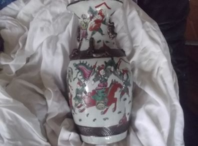 a large  antique chinese porcelain famille rose vase with chinese warrior