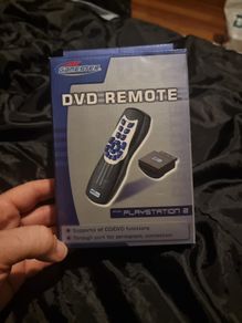 DVD Remote , Receiver and Manual Play your DVD and Audio CD with your Ps2