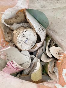 Bag of broken crockery