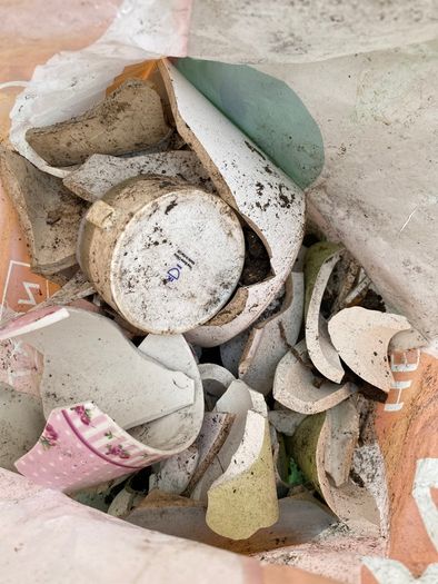 Bag of broken crockery