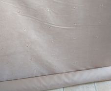 16:7 meters of beige curtain material plus lining