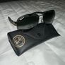 Ray-Ban aviator sunglasses. Image 4