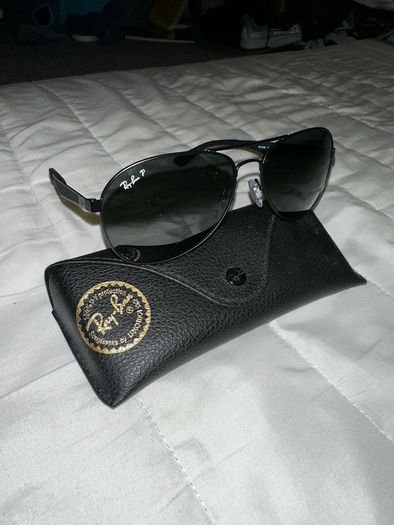 Ray-Ban aviator sunglasses.