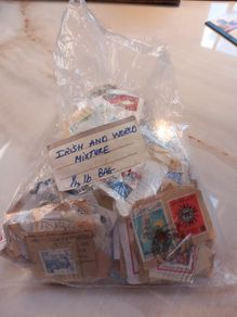 Quarter pound of used Irish and global stamps, unchecked, D18 post 7e
