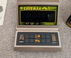 Grandstand Cave man handheld for repair