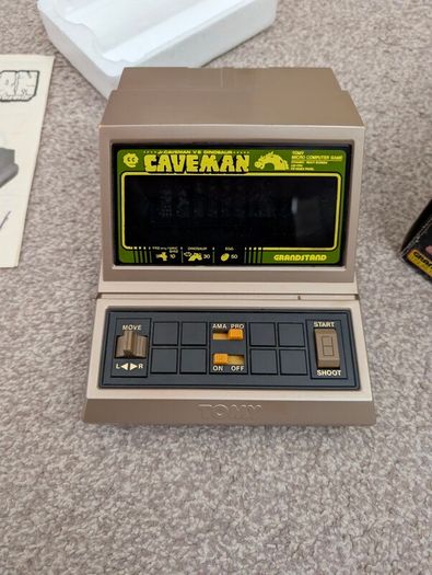Grandstand Cave man handheld for repair