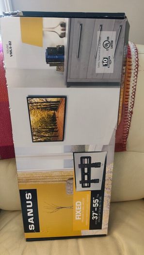 LG 40" Ultra HD TV + Wall bracket ( new in box)
