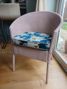 Soft pink Lloyd loom chair