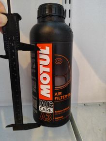 Motul air filter oil 1l 80% left, as shown in the picture with the caliper