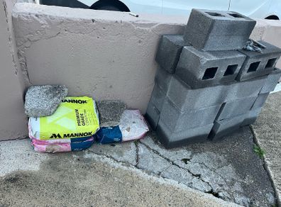 Brand new bricks and bran new bags cement