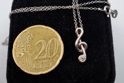 9ct white gold treble clef pendant necklace