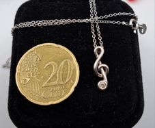 9ct white gold treble clef pendant necklace