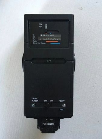Pentax 35mm camera and lens