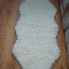 Synthetic sheepskin rug.