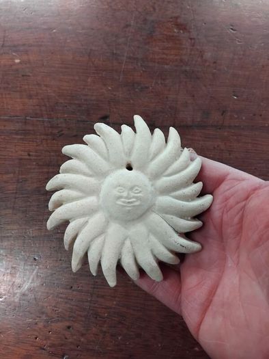 Two Terracotta Faces