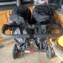 Out n about double buggy with raincover Image 2