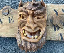 Devil wood carving sign