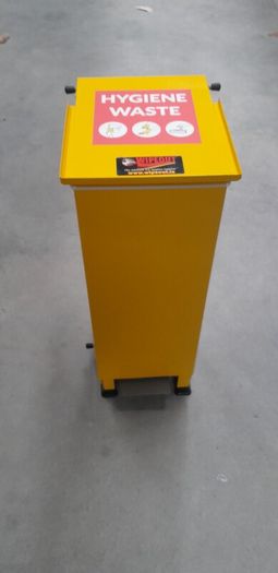 Hygiene waste bin. Height 600 mm. Width 230mm. Depth 290mm.