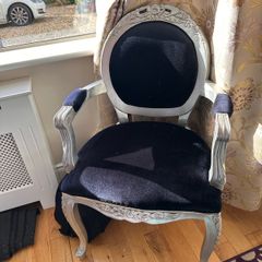 Silver and black antique chair