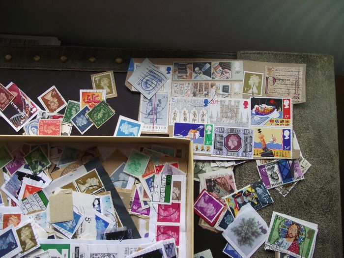A box with collection of stamps from Great Britain