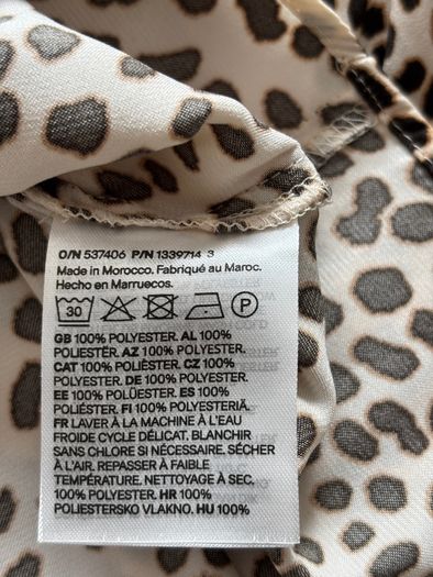 Animal print blouse - cream and black