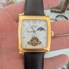 The image shows a Trias men's mechanical watch in a rectangular "tank" case.