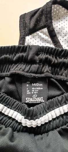 Basketball kit Spalding reversible black and white 10-11 years size 140