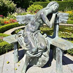 Bronze sleeping girl sculpture