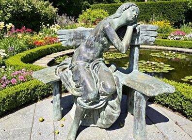 Bronze sleeping girl sculpture