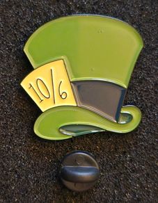 Mad hatter ! , pin back badge.