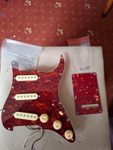 Squier strat loaded pickguard and backplate with screws